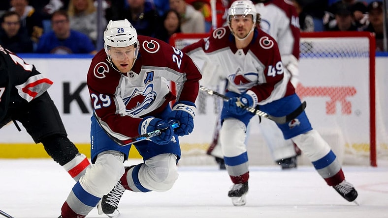 Oct 29, 2023; Buffalo, New York, USA;  Colorado Avalanche center Nathan MacKinnon (29) skates up ice for a loose puck during the first period against the Buffalo Sabres at KeyBank Center. Mandatory Credit: Timothy T. Ludwig-USA TODAY Sports