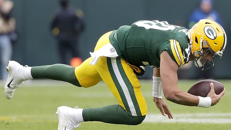 Oct 29, 2023; Green Bay, Wisconsin, USA; Green Bay Packers quarterback Jordan Love (10) against the Minnesota Vikings during their football game at Lambeau Field. Mandatory Credit: Wm. Glasheen-USA TODAY Sports