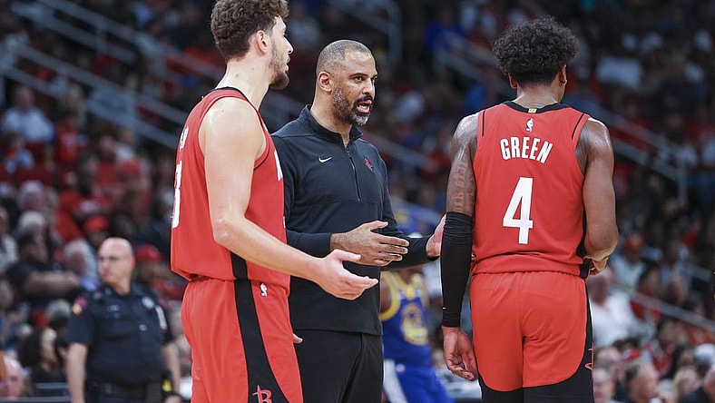 Oct 29, 2023; Houston, Texas, USA; Houston Rockets head coach Ime Udoka talks with center Alperen Sengun (28) and guard Jalen Green (4) during the game against the Golden State Warriors at Toyota Center. Mandatory Credit: Troy Taormina-USA TODAY Sports