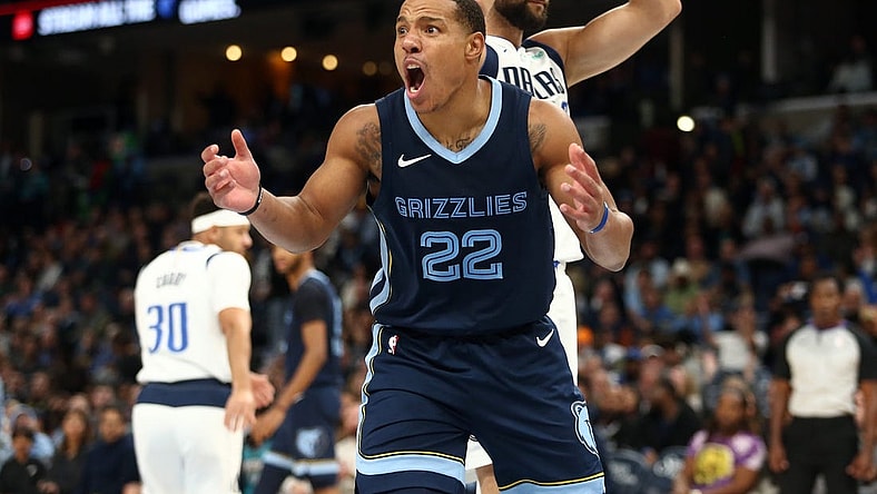 Oct 30, 2023; Memphis, Tennessee, USA; Memphis Grizzlies guard Desmond Bane (22) reacts after being called for an offensive foul during the second half against the Dallas Mavericks at FedExForum. Mandatory Credit: Petre Thomas-USA TODAY Sports