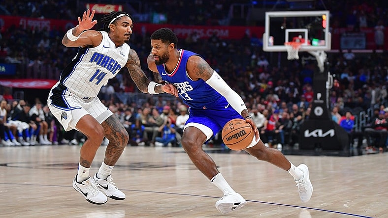 Oct 31, 2023; Los Angeles, California, USA; Los Angeles Clippers forward Paul George (13) moves the ball against during the first half at Crypto.com Arena. Mandatory Credit: Gary A. Vasquez-USA TODAY Sports