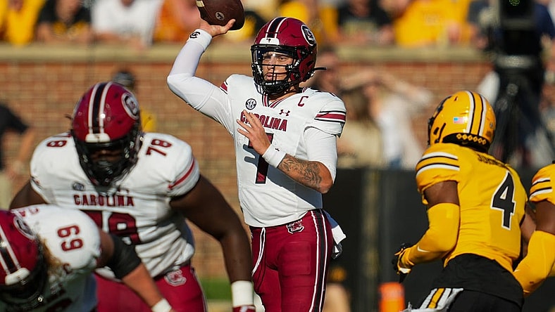 Oct 21, 2023; Columbia, Missouri, USA; South Carolina Gamecocks quarterback Spencer Rattler (7) throws a pass during the first half against the Missouri Tigers at Faurot Field at Memorial Stadium. Mandatory Credit: Jay Biggerstaff-USA TODAY Sports