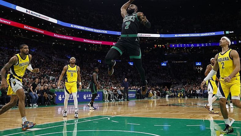 Nov 1, 2023; Boston, Massachusetts, USA; Boston Celtics guard Jaylen Brown (7) goes through the Indiana Pacers defense to dunk during the first quarter at TD Garden. Mandatory Credit: Winslow Townson-USA TODAY Sports