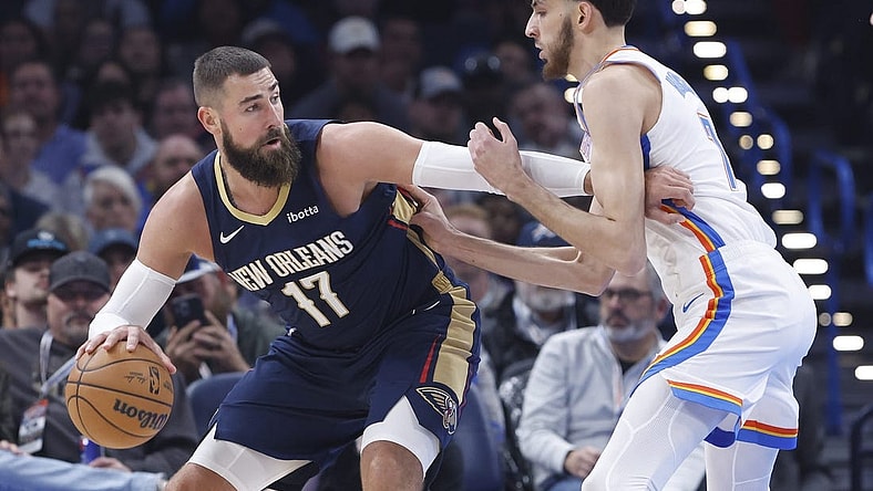 Nov 1, 2023; Oklahoma City, Oklahoma, USA; New Orleans Pelicans center Jonas Valanciunas (17) drives against Oklahoma City Thunder forward Chet Holmgren (7) during the first quarter at Paycom Center. Mandatory Credit: Alonzo Adams-USA TODAY Sports