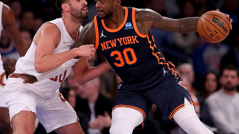 Nov 1, 2023; New York, New York, USA; New York Knicks forward Julius Randle (30) controls the ball against Cleveland Cavaliers forward Georges Niang (20) during the first quarter at Madison Square Garden. Mandatory Credit: Brad Penner-USA TODAY Sports