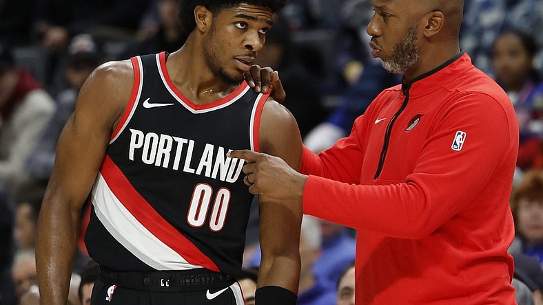 Nov 1, 2023; Detroit, Michigan, USA;  Portland Trail Blazers head coach Chauncey Billups talks to guard Scoot Henderson (00) in the first half against the Detroit Pistons at Little Caesars Arena. Mandatory Credit: Rick Osentoski-USA TODAY Sports