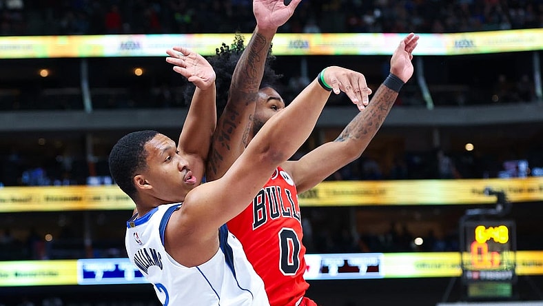 Nov 1, 2023; Dallas, Texas, USA;  Dallas Mavericks forward Grant Williams (3) shoots past Chicago Bulls guard Coby White (0) during the first quarter at American Airlines Center. Mandatory Credit: Kevin Jairaj-USA TODAY Sports