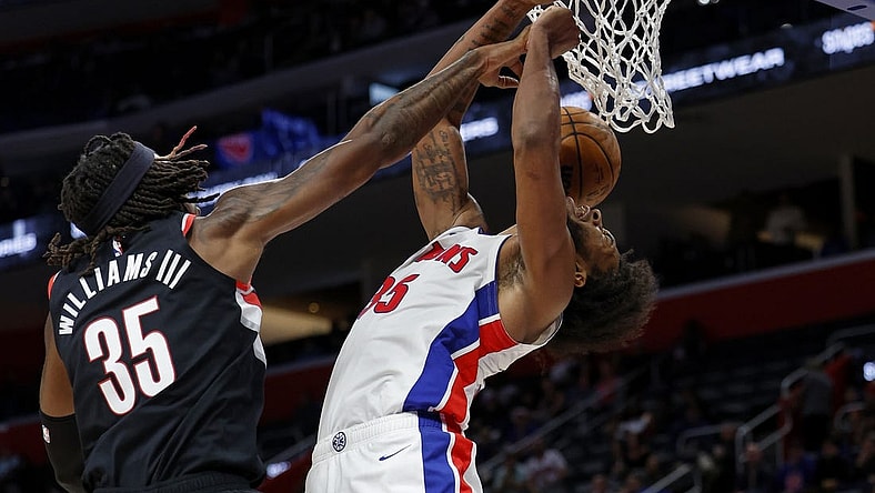 Nov 1, 2023; Detroit, Michigan, USA;  Portland Trail Blazers center Robert Williams III (35) blocks a shot by Detroit Pistons forward Marvin Bagley III (35) in the second half at Little Caesars Arena. Mandatory Credit: Rick Osentoski-USA TODAY Sports