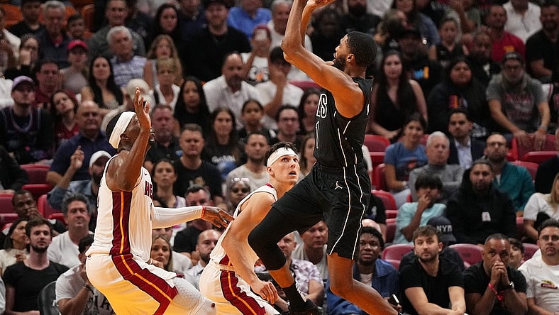 Nov 1, 2023; Miami, Florida, USA; Brooklyn Nets forward Mikal Bridges (1) puts up a shot against the Miami Heat during the second half at Kaseya Center. Mandatory Credit: Jasen Vinlove-USA TODAY Sports