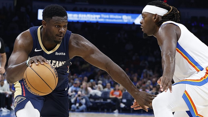 Nov 1, 2023; Oklahoma City, Oklahoma, USA; New Orleans Pelicans forward Zion Williamson (1) drives against Oklahoma City Thunder guard Luguentz Dort (5) during the second half at Paycom Center. New Orleans won 110-106. Mandatory Credit: Alonzo Adams-USA TODAY Sports