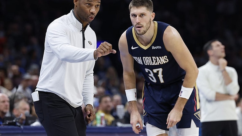 Nov 1, 2023; Oklahoma City, Oklahoma, USA; New Orleans Pelicans head coach Willie Green talks to New Orleans Pelicans forward Matt Ryan (37) between plays against the Oklahoma City Thunder during the second half at Paycom Center. New Orleans won 110-106. Mandatory Credit: Alonzo Adams-USA TODAY Sports