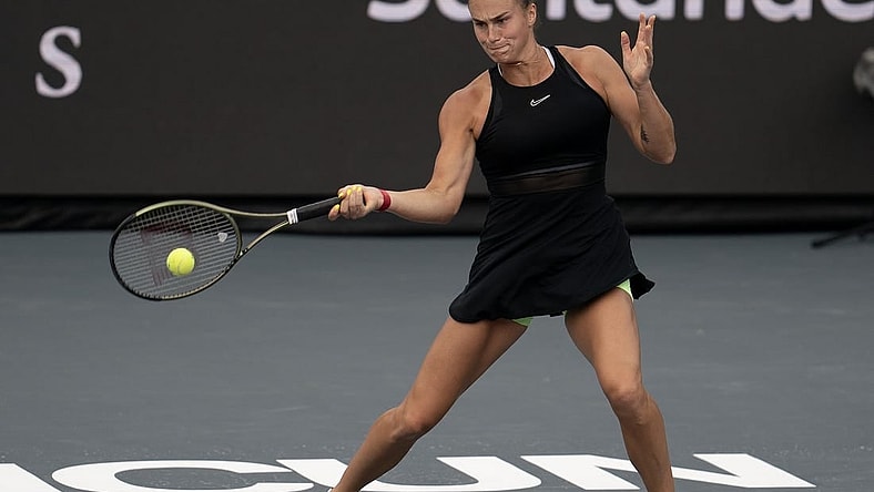 Nov 3, 2023; Cancun, Mexico;  Aryna Sabalenka returns a shot during her match against Elena Rybakina (KAZ) on day six of the GNP Saguaros WTA Finals Cancun. Mandatory Credit: Susan Mullane-USA TODAY Sports