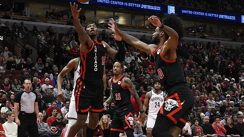 Nov 3, 2023; Chicago, Illinois, USA; Chicago Bulls forward Torrey Craig (13) and guard Coby White (0) chase a rebound against the Brooklyn Nets during the first half at the United Center. Mandatory Credit: Matt Marton-USA TODAY Sports