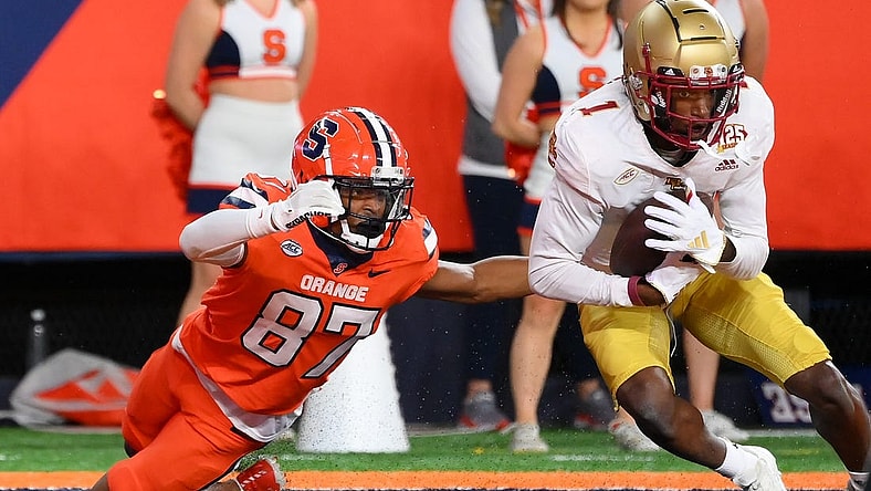 Nov 3, 2023; Syracuse, New York, USA; Boston College Eagles defensive back Elijah Jones (1) intercepts a pass in the end zone in front of Syracuse Orange wide receiver Donovan Brown (87) during the first half at the JMA Wireless Dome. Mandatory Credit: Rich Barnes-USA TODAY Sports