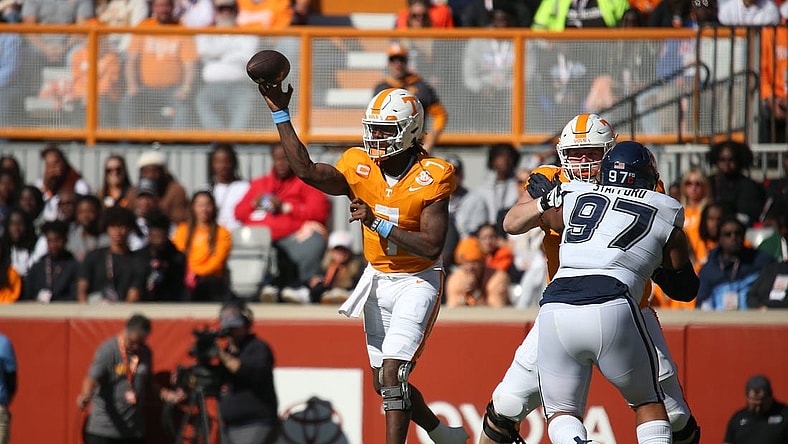 Nov 4, 2023; Knoxville, Tennessee, USA; Tennessee Volunteers quarterback Joe Milton III (7) passes the ball against the Connecticut Huskies during the first half at Neyland Stadium. Mandatory Credit: Randy Sartin-USA TODAY Sports