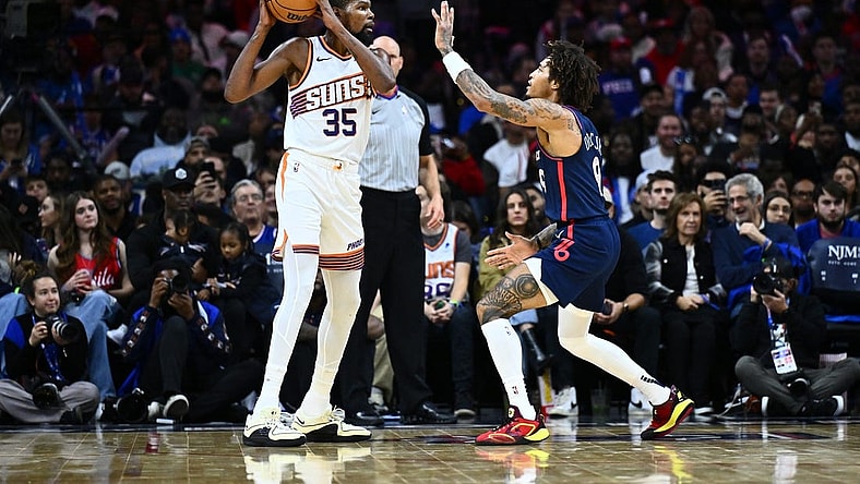 Nov 4, 2023; Philadelphia, Pennsylvania, USA; Phoenix Suns forward Kevin Durant (35) controls the ball against Philadelphia 76ers guard Kelly Oubre Jr (9) in the third quarter at Wells Fargo Center. Mandatory Credit: Kyle Ross-USA TODAY Sports