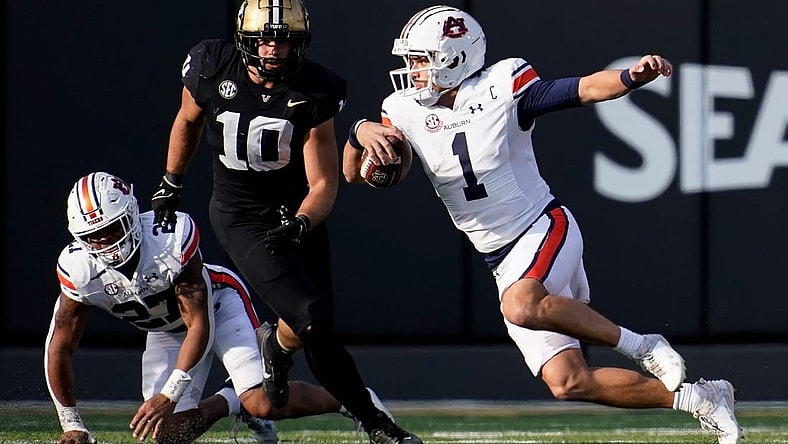 Auburn quarterback Payton Thorne (1) runs the ball against Vanderbilt during the first quarter at FirstBank Stadium in Nashville, Tenn., Saturday, Nov. 4, 2023.