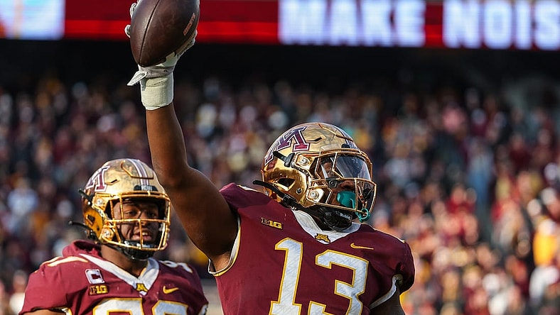 Nov 4, 2023; Minneapolis, Minnesota, USA; Minnesota Golden Gophers defensive lineman Chris Collins (13) celebrates after recovering a fumble against the Illinois Fighting Illini during the second half at Huntington Bank Stadium. Mandatory Credit: Matt Krohn-USA TODAY Sports
