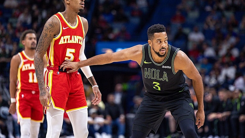 Nov 4, 2023; New Orleans, Louisiana, USA; New Orleans Pelicans guard CJ McCollum (3) guards Atlanta Hawks guard Dejounte Murray (5) during the first half at Smoothie King Center. Mandatory Credit: Stephen Lew-USA TODAY Sports