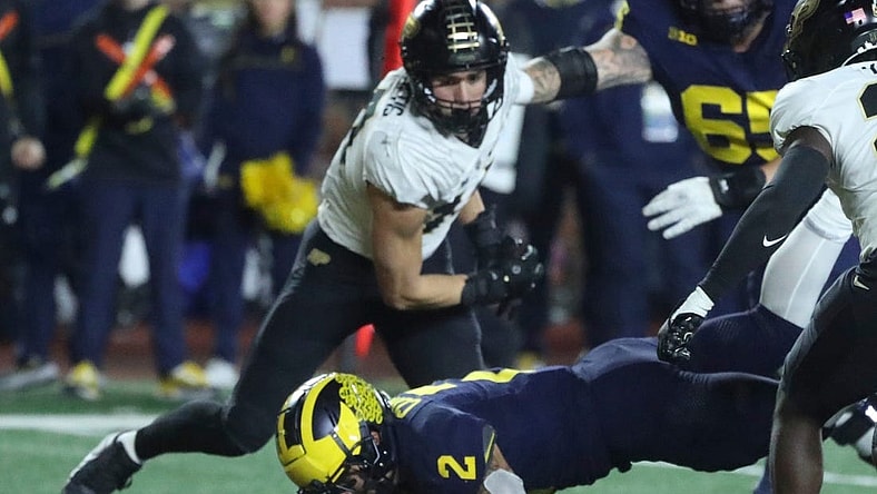 Michigan Wolverines running back Blake Corum (2) scores a touchdown against the Purdue Boilermakers during the first half at Michigan Stadium, Saturday, Nov. 4, 2023.
