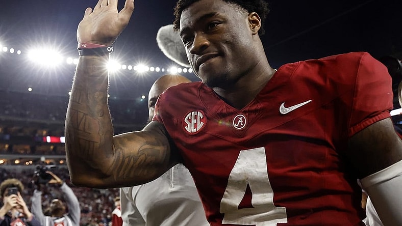 Nov 4, 2023; Tuscaloosa, Alabama, USA; Alabama Crimson Tide quarterback Jalen Milroe (4) waves to fans as he walks off the field during the second half at Bryant-Denny Stadium. Mandatory Credit: Butch Dill-USA TODAY Sports