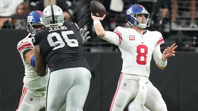 November 5, 2023; Paradise, Nevada, USA; New York Giants quarterback Daniel Jones (8) passes the football against the Las Vegas Raiders during the first quarter at Allegiant Stadium. Mandatory Credit: Kyle Terada-USA TODAY Sports