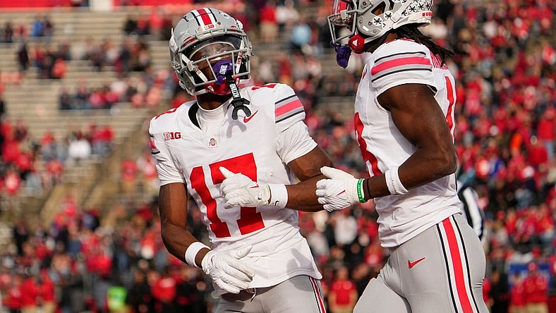 Nov 4, 2023; Piscataway, New Jersey, USA; Ohio State Buckeyes wide receiver Carnell Tate (17) congratulates wide receiver Marvin Harrison Jr. (18) after he scored a touchdown during the NCAA football game against the Rutgers Scarlet Knights at SHI Stadium. Ohio State won 35-16.