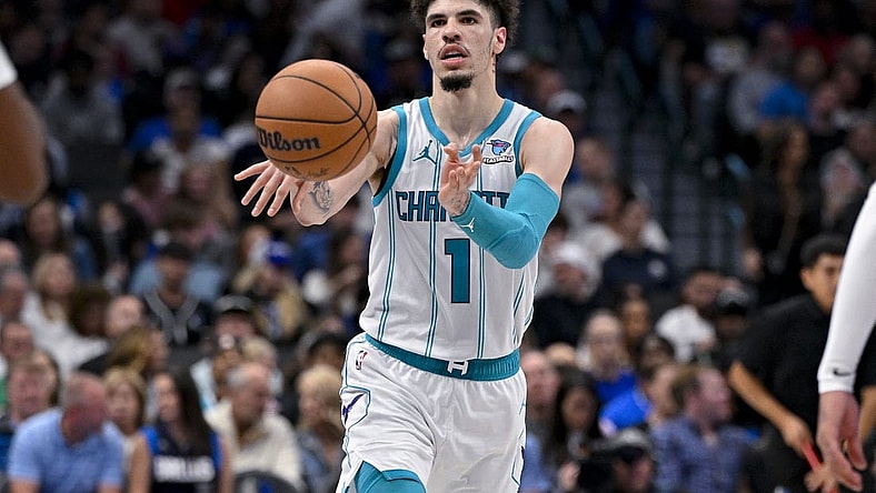 Nov 5, 2023; Dallas, Texas, USA; Charlotte Hornets guard LaMelo Ball (1) passes the ball against the Dallas Mavericks during the second half at the American Airlines Center. Mandatory Credit: Jerome Miron-USA TODAY Sports