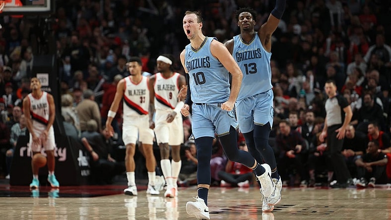 Nov 5, 2023; Portland, Oregon, USA; Memphis Grizzlies guard Luke Kennard (10) reacts after making a three point shot against the Portland Trail Blazers in the second half at Moda Center. Mandatory Credit: Jaime Valdez-USA TODAY Sports