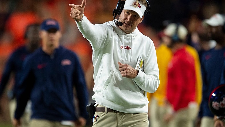 Mississippi Rebels coach Lane Kiffin celebrates a pass interference call as Auburn Tigers take on Mississippi Rebels at Jordan-Hare Stadium in Auburn, Ala., on Saturday, Oct. 21, 2023. Mississippi Rebels defeated Auburn Tigers 28-21.