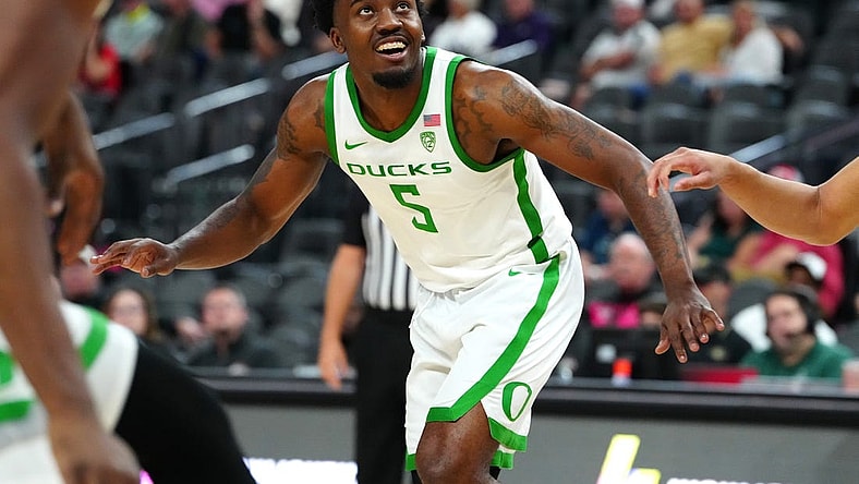 Nov 6, 2023; Las Vegas, Nevada, USA; Oregon Ducks guard Jermaine Couisnard (5) plays against the Georgia Bulldogs during the second half at T-Mobile Arena. Mandatory Credit: Stephen R. Sylvanie-USA TODAY Sports