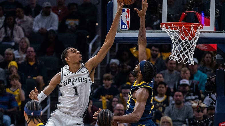 Nov 6, 2023; Indianapolis, Indiana, USA; San Antonio Spurs center Victor Wembanyama (1) shoots the ball while Indiana Pacers forward Isaiah Jackson (22) defends in the first half at Gainbridge Fieldhouse. Mandatory Credit: Trevor Ruszkowski-USA TODAY Sports