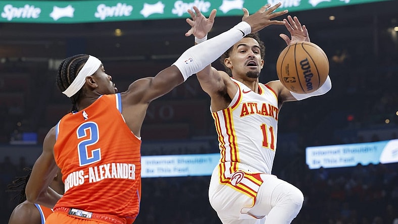 Nov 6, 2023; Oklahoma City, Oklahoma, USA; Oklahoma City Thunder guard Shai Gilgeous-Alexander (2) defends Atlanta Hawks guard Trae Young (11) as he looses control of the ball during the first quarter at Paycom Center. Mandatory Credit: Alonzo Adams-USA TODAY Sports