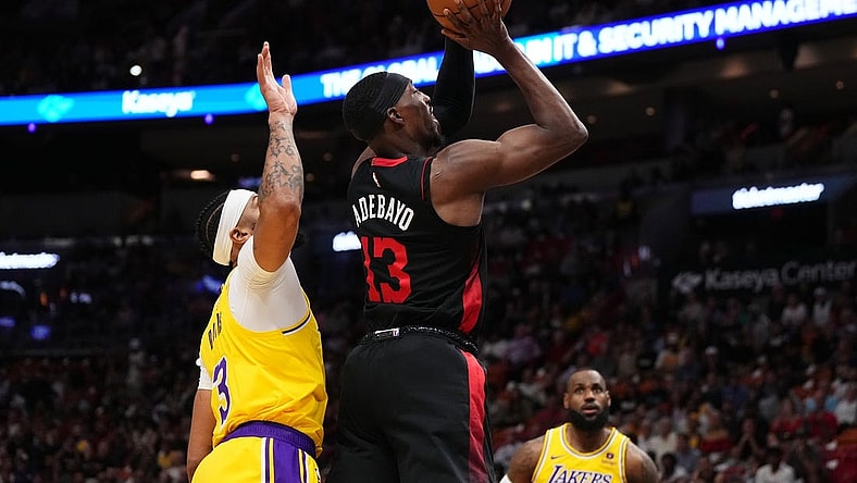 Nov 6, 2023; Miami, Florida, USA; Miami Heat center Bam Adebayo (13) puts up a shot against the Los Angeles Lakers during the first half at Kaseya Center. Mandatory Credit: Jasen Vinlove-USA TODAY Sports
