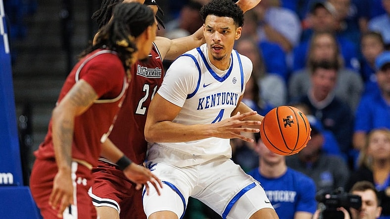 Nov 6, 2023; Lexington, Kentucky, USA; Kentucky Wildcats forward Tre Mitchell (4) handles the ball during the first half against the New Mexico State Aggies at Rupp Arena at Central Bank Center. Mandatory Credit: Jordan Prather-USA TODAY Sports