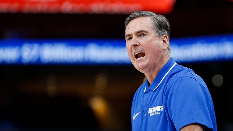 Memphis' assistant coach Rick Stansbury, who is covering for suspended head coach Penny Hardaway, shouts to his players during the season opener between the University of Memphis and Jackson State University at FedExForum in Memphis, Tenn., on Monday, November 6, 2023.