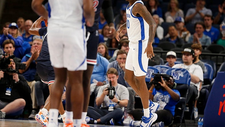 Memphis' Jaykwon Walton (10) celebrates after dunking the ball during the season opener between the University of Memphis and Jackson State University at FedExForum in Memphis, Tenn., on Monday, November 6, 2023.