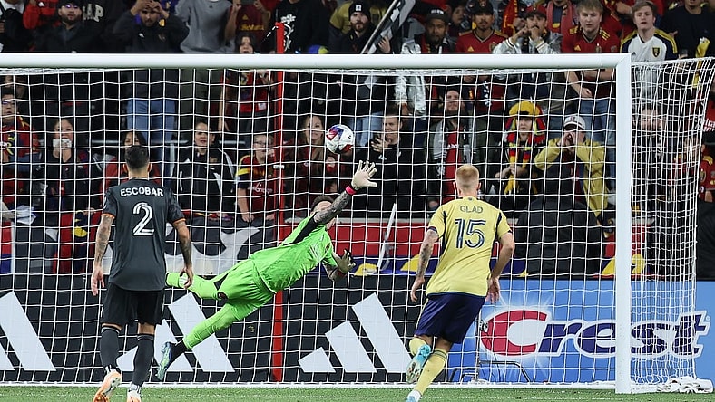 Nov 6, 2023; Sandy, Utah, USA; Houston Dynamo goalkeeper Steve Clark (12) allows a goal scored by Real Salt Lake forward Jefferson Savarino (10) during the second half at America First Field. Mandatory Credit: Rob Gray-USA TODAY Sports