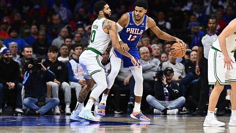 Nov 8, 2023; Philadelphia, Pennsylvania, USA; Boston Celtics forward Jayson Tatum (0) defends Philadelphia 76ers forward Tobias Harris (12) in the second quarter at Wells Fargo Center. Mandatory Credit: Kyle Ross-USA TODAY Sports