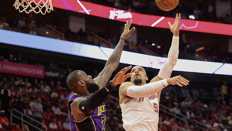 Nov 8, 2023; Houston, Texas, USA; Houston Rockets forward Dillon Brooks (9) shoots against Los Angeles Lakers forward LeBron James (23) in the first quarter at Toyota Center. Mandatory Credit: Thomas Shea-USA TODAY Sports