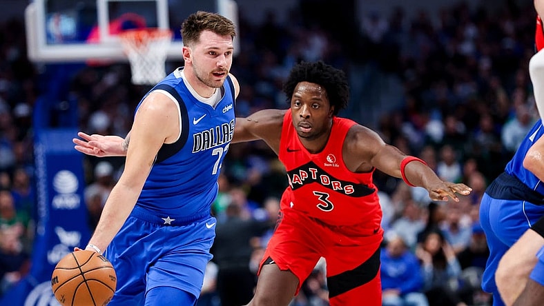 Nov 8, 2023; Dallas, Texas, USA;  Dallas Mavericks guard Luka Doncic (77) dribbles past Toronto Raptors forward O.G. Anunoby (3) during the first quarter at American Airlines Center. Mandatory Credit: Kevin Jairaj-USA TODAY Sports