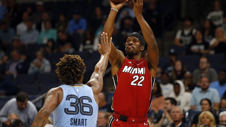 Nov 8, 2023; Memphis, Tennessee, USA; Miami Heat forward Jimmy Butler (22) shoots for three during the first half against the Memphis Grizzlies at FedExForum. Mandatory Credit: Petre Thomas-USA TODAY Sports