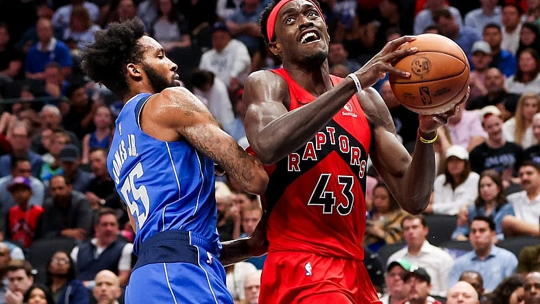 Nov 8, 2023; Dallas, Texas, USA; Toronto Raptors forward Pascal Siakam (43) looks to shoot as Dallas Mavericks forward Derrick Jones Jr. (55) defends during the second half at American Airlines Center. Mandatory Credit: Kevin Jairaj-USA TODAY Sports