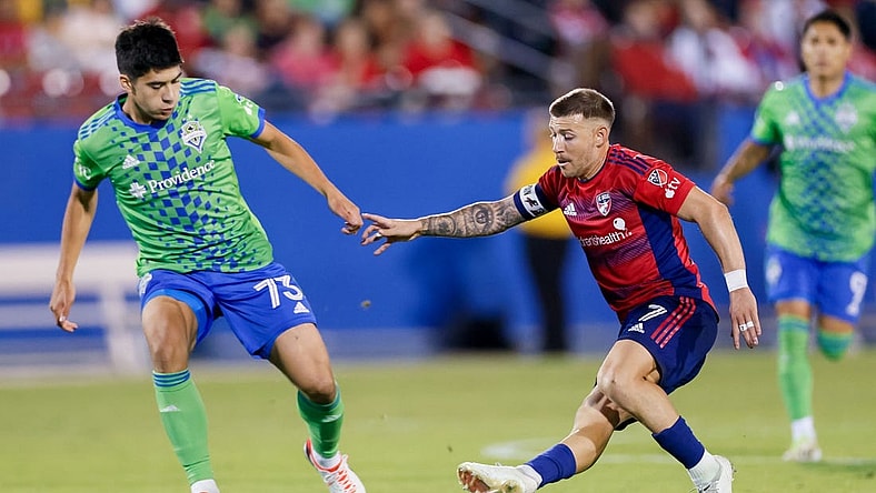 Nov 4, 2023; Frisco, Texas, USA; FC Dallas forward Paul Arriola (7) and Seattle Sounders midfielder Obed Vargas (73) during the second half of game two in a round one match of the 2023 MLS Cup Playoffs at Toyota Stadium. Mandatory Credit: Andrew Dieb-USA TODAY Sports
