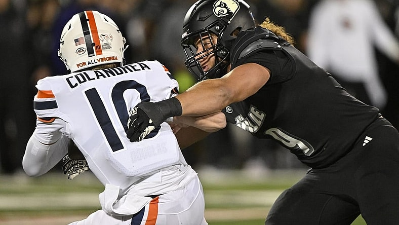 Nov 9, 2023; Louisville, Kentucky, USA; Louisville Cardinals defensive lineman Ashton Gillotte (9) sacks Virginia Cavaliers quarterback Anthony Colandrea (10) during the first quarter at L&N Federal Credit Union Stadium. Mandatory Credit: Jamie Rhodes-USA TODAY Sports