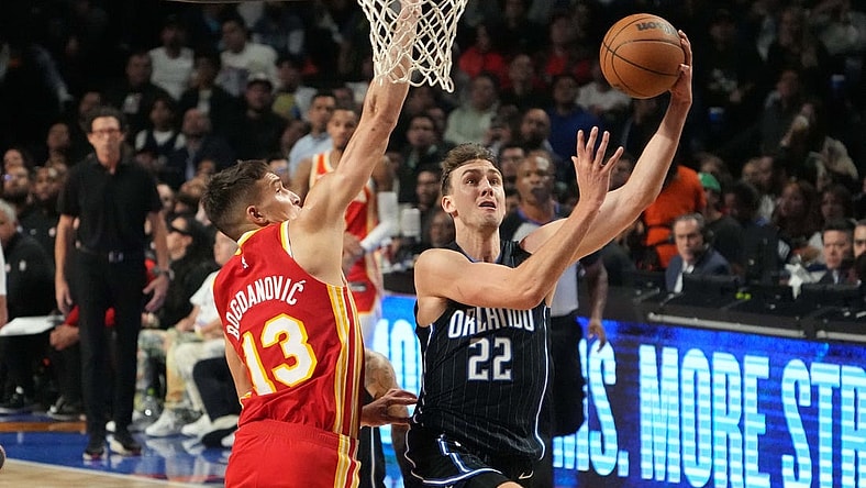 Nov 9, 2023; Mexico City, MEX; Orlando Magic forward Franz Wagner (22) shoots the ball against Atlanta Hawks guard Bogdan Bogdanovic (13) in the first half during the 2023 NBA Mexico City Game at the Arena CDMX. Mandatory Credit: Kirby Lee-USA TODAY Sports