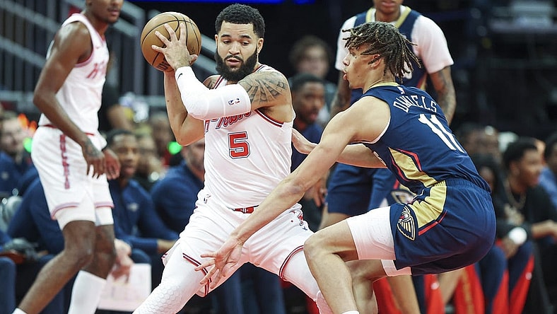 Nov 10, 2023; Houston, Texas, USA; Houston Rockets guard Fred VanVleet (5) controls the ball as New Orleans Pelicans guard Dyson Daniels (11) defends during the first quarter at Toyota Center. Mandatory Credit: Troy Taormina-USA TODAY Sports