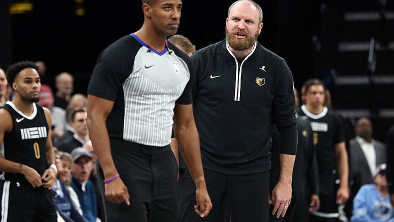 Nov 10, 2023; Memphis, Tennessee, USA; Memphis Grizzlies head coach Taylor Jenkins (right) reacts to a referee after a foul call during the second half against the Utah Jazz at FedExForum. Mandatory Credit: Petre Thomas-USA TODAY Sports