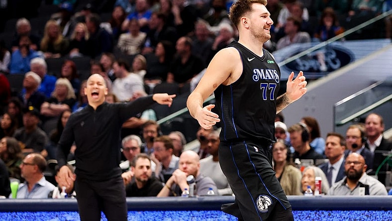 Nov 10, 2023; Dallas, Texas, USA;  Dallas Mavericks guard Luka Doncic (77) reacts in front of LA Clippers head coach Tyronn Lue during the second half at American Airlines Center. Mandatory Credit: Kevin Jairaj-USA TODAY Sports