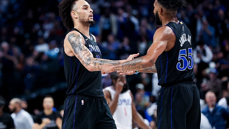 Nov 10, 2023; Dallas, Texas, USA;  Dallas Mavericks forward Derrick Jones Jr. (55) celebrates with Dallas Mavericks center Dereck Lively II (2) during the second half against the LA Clippers at American Airlines Center. Mandatory Credit: Kevin Jairaj-USA TODAY Sports